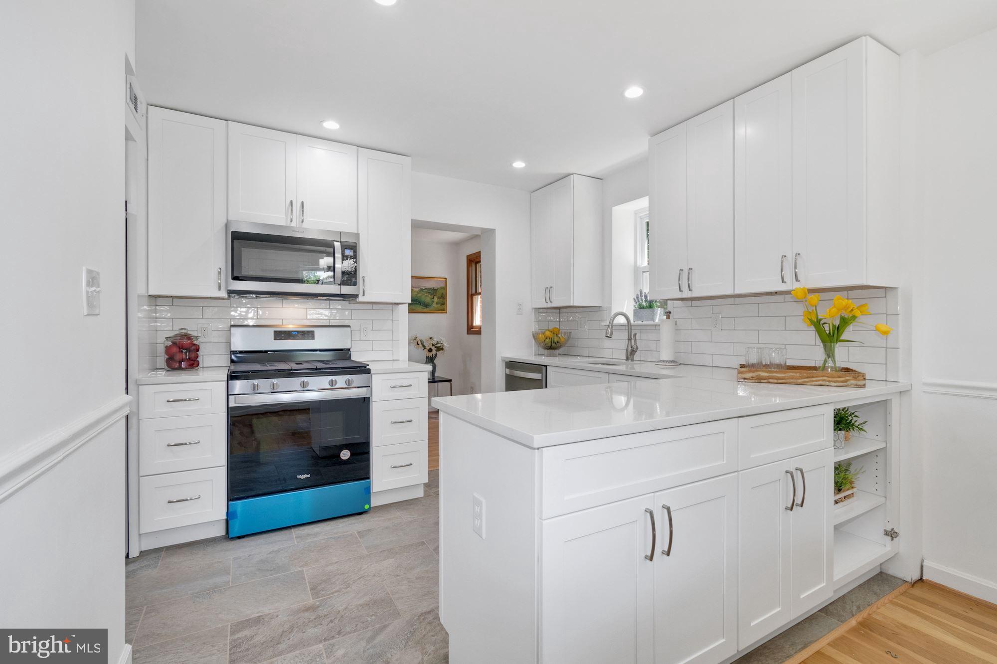 2705 Arvin Street Silver Spring, MD 20902 - Photo 13 of 31 Island divided kitchen/dinning