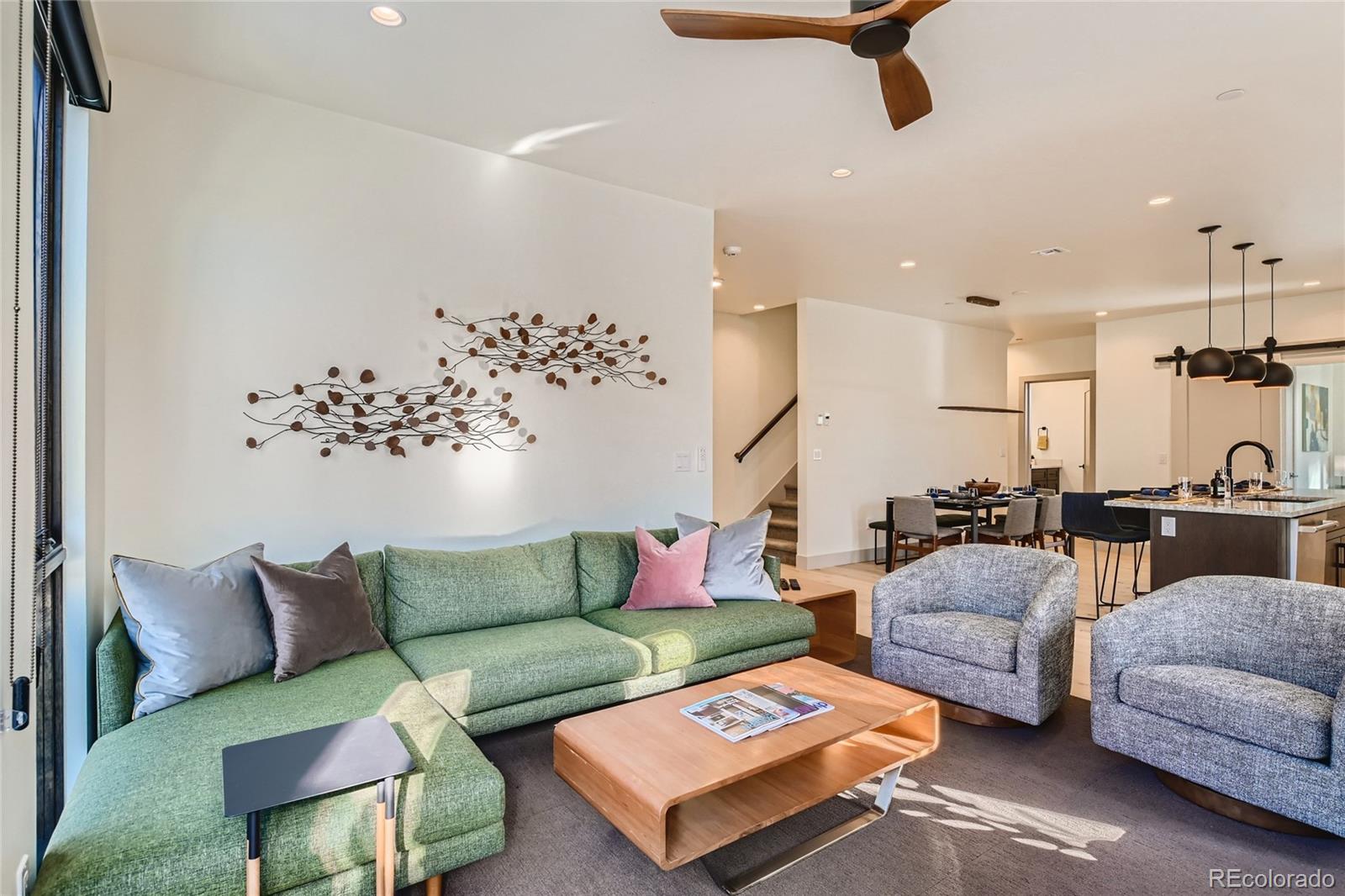 46 6th Street Silverthorne, CO 80498 - Photo 7 of 28 a living room with furniture and kitchen view