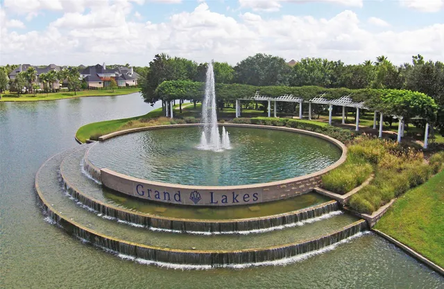 a view of a swimming pool with a lake view