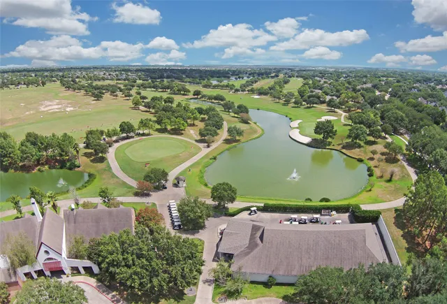 an aerial view of a house with a ocean view