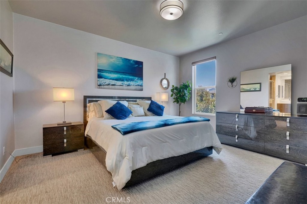 59 Gramercy Irvine, CA 92612 - Photo 26 of 71 a living room with a bed and furniture