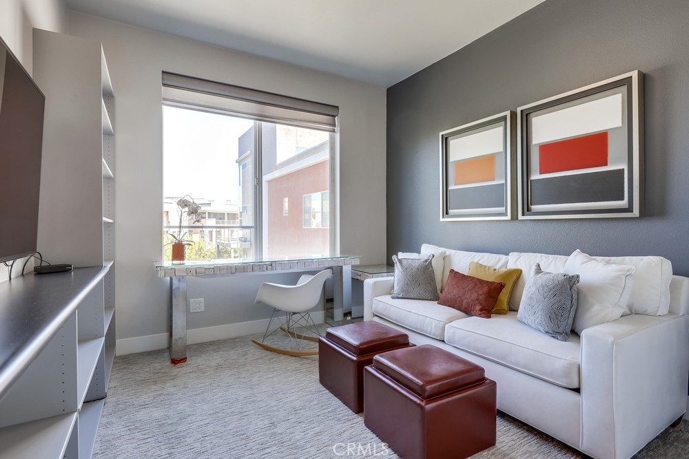 59 Gramercy Irvine, CA 92612 - Photo 39 of 71 a living room with furniture and windows