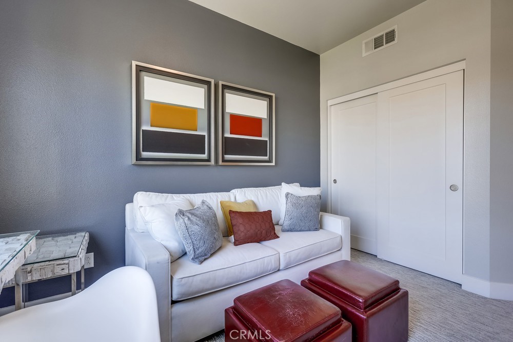 59 Gramercy Irvine, CA 92612 - Photo 41 of 71 a living room with furniture and a window