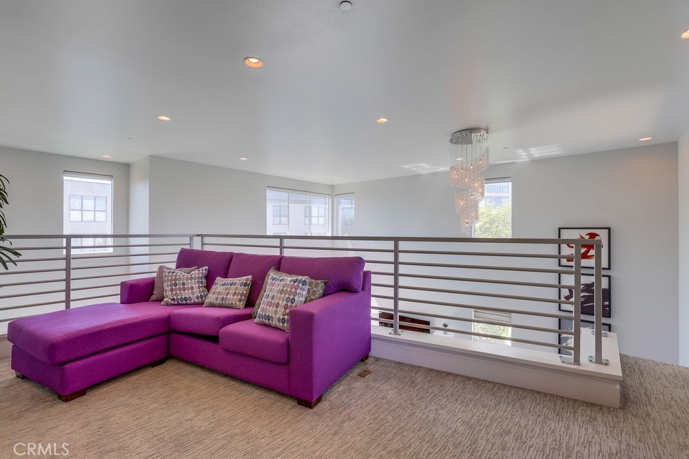 59 Gramercy Irvine, CA 92612 - Photo 48 of 71 a living room with furniture and a window