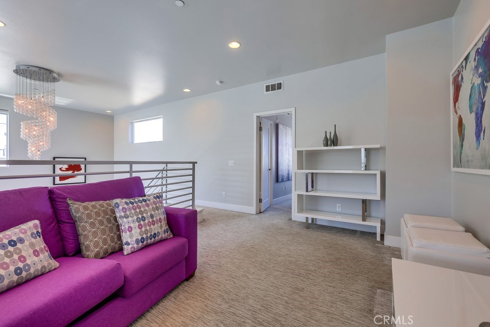 59 Gramercy Irvine, CA 92612 - Photo 49 of 71 a living room with furniture and a couch