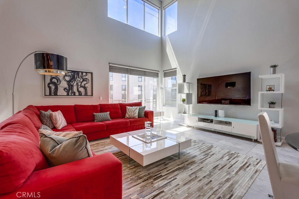 59 Gramercy Irvine, CA 92612 - Photo 6 of 71 a living room with furniture and a flat screen tv