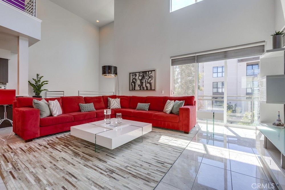 59 Gramercy Irvine, CA 92612 - Photo 7 of 71 a living room with furniture and a rug