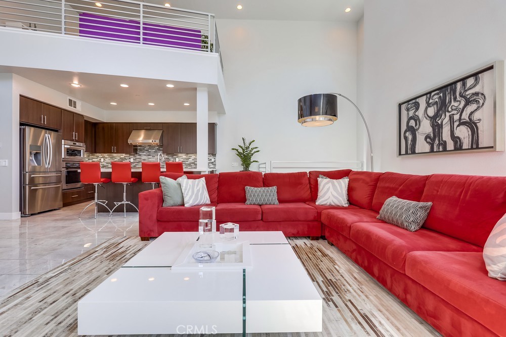 59 Gramercy Irvine, CA 92612 - Photo 8 of 71 a very nice looking living room with furniture and a rug