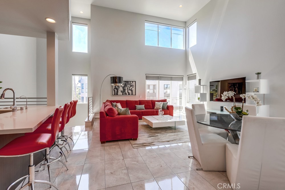 59 Gramercy Irvine, CA 92612 - Photo 9 of 71 a living room with furniture a flat screen tv and a window