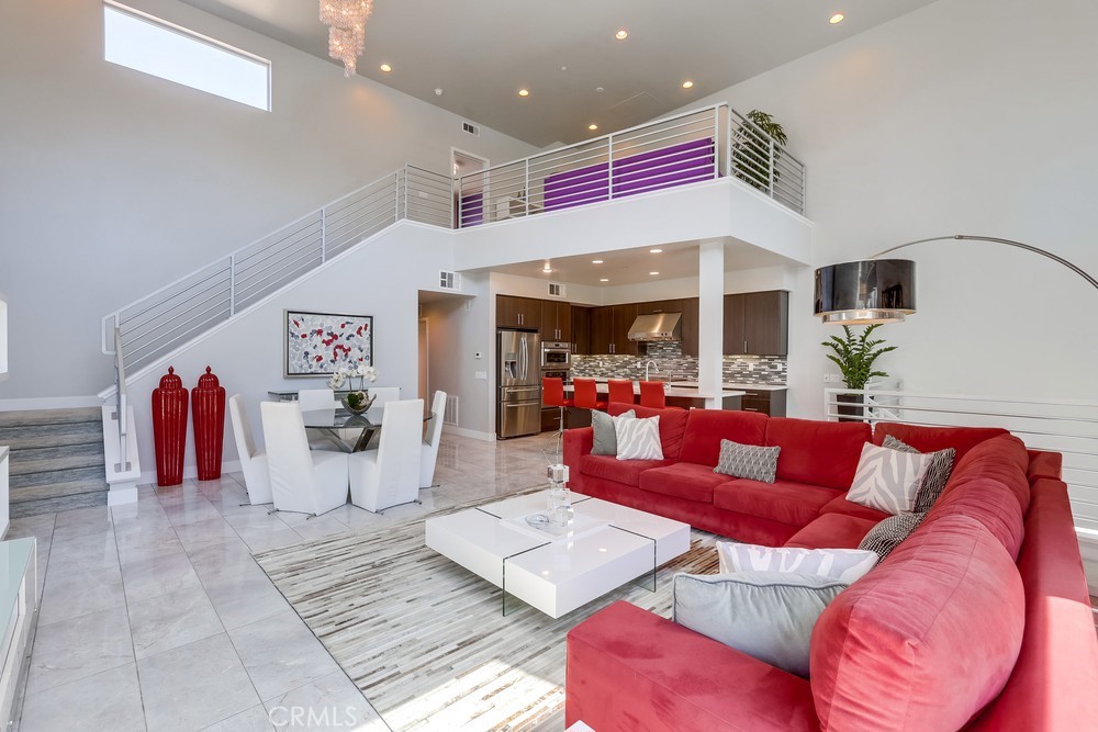 59 Gramercy Irvine, CA 92612 - Photo 10 of 71 a living room with furniture and a table