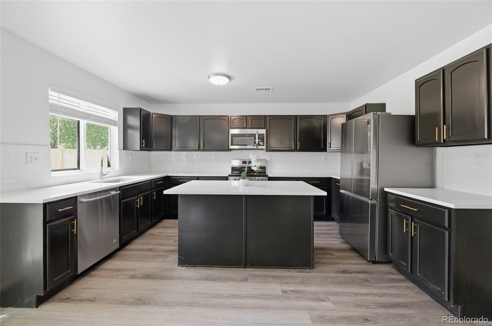 4839 Liverpool Street Denver, CO 80249 - Photo 3 of 25