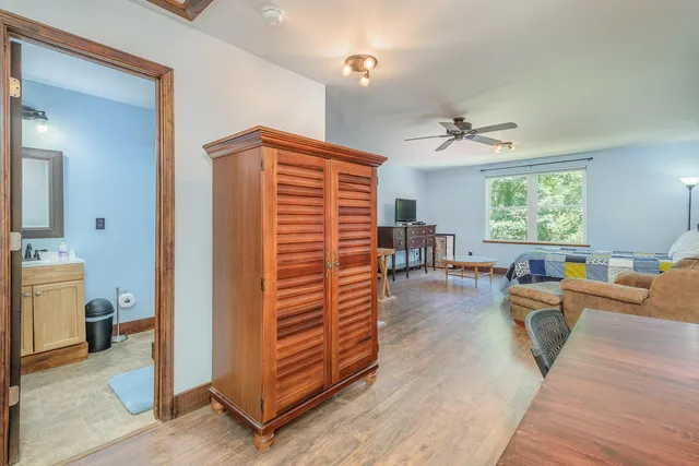 a view of a balcony with wooden floor