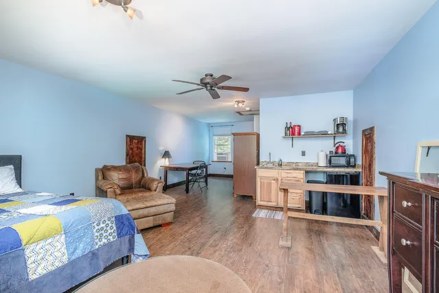 a view of a house with a street