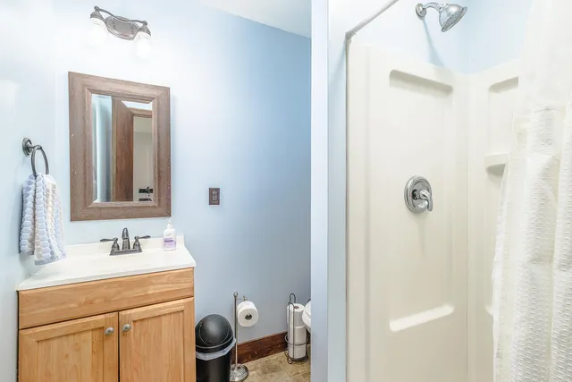 a building outdoor space with patio furniture and potted plants