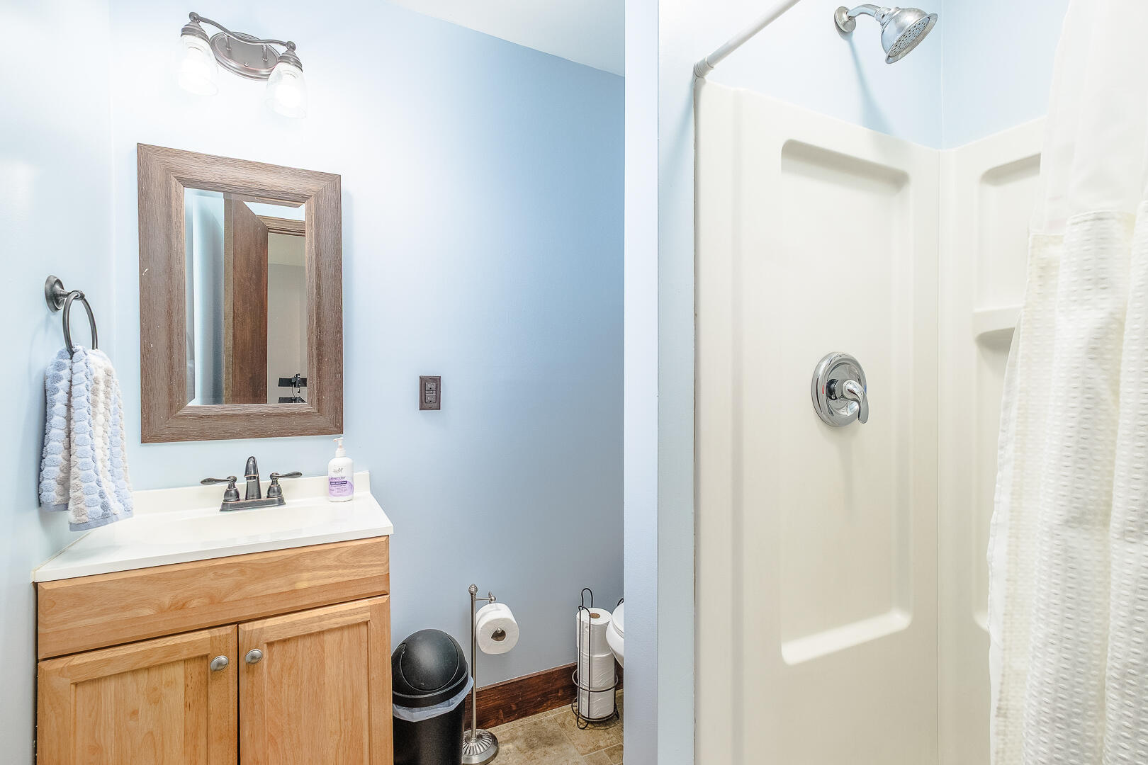 57 Hemlock Ridge Lane Catawba, VA 24070 - Photo 36 of 89 a bathroom with a granite countertop sink a mirror and toilet