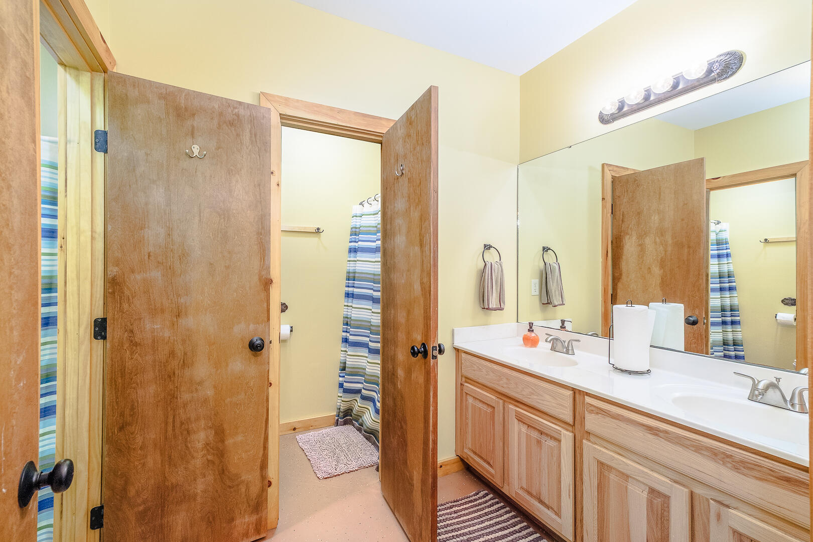 57 Hemlock Ridge Lane Catawba, VA 24070 - Photo 43 of 89 a bathroom with a double vanity sink toilet and shower