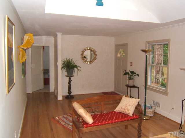 1213 Lorimer Road Raleigh, NC 27606 - Photo 7 of 20 Large Living Room with hardwood floors.