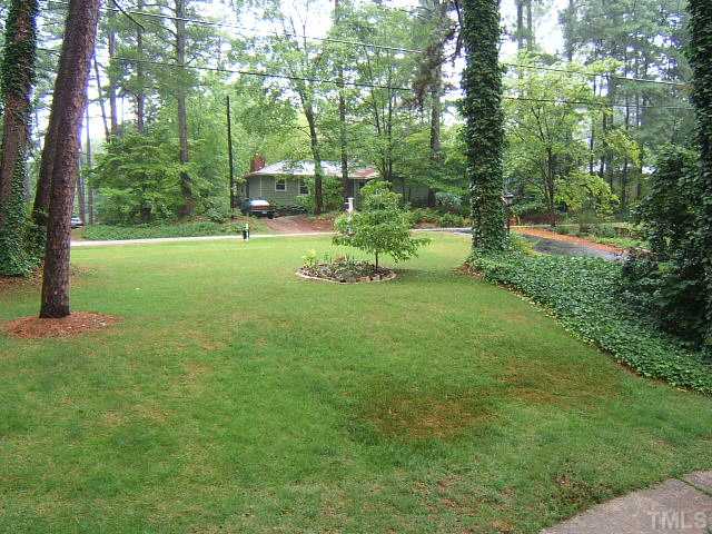 1213 Lorimer Road Raleigh, NC 27606 - Photo 10 of 20 Large landscaped yard in well established neighborhood.