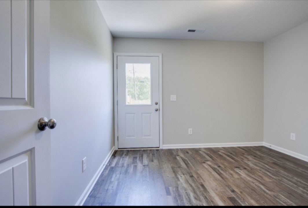 113 Bright Avenue Carthage, TN 37030 - Photo 11 of 14 a view of a room with wooden floor