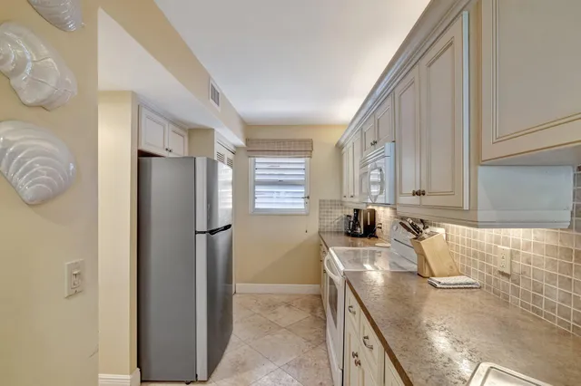 a bedroom with a bed and furniture