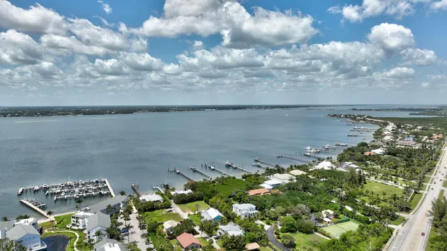 a aerial view of a house with a ocean view