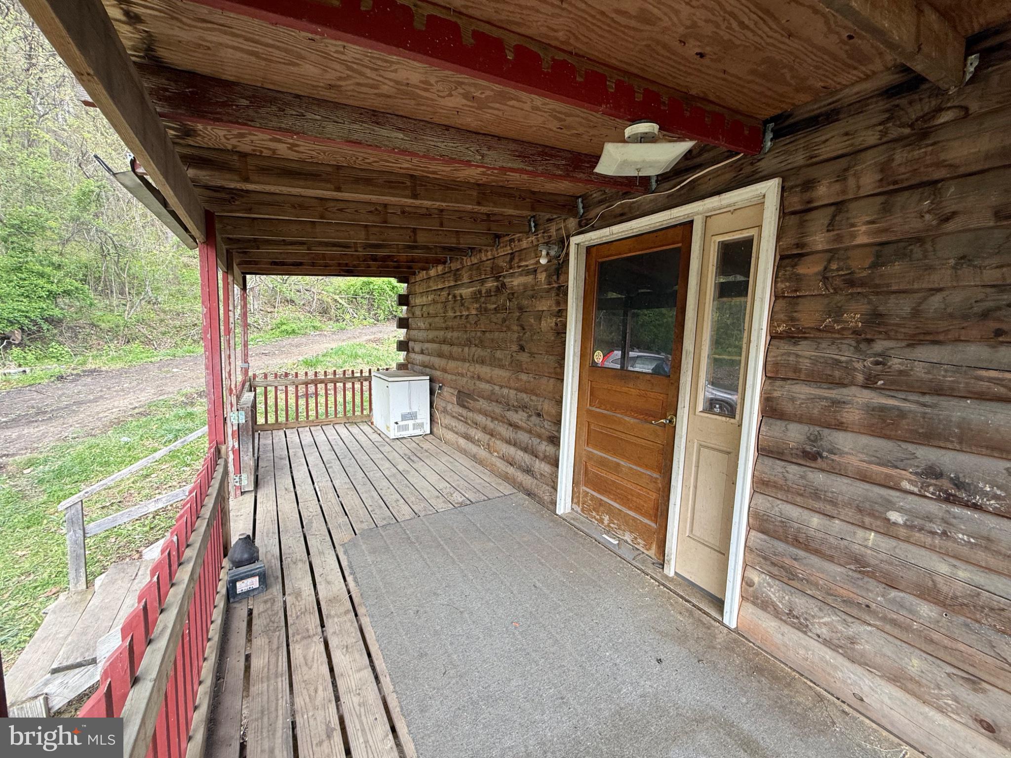 15232 Wrangletown Road Mount Union, PA 17066 - Photo 65 of 92 Charming rustic porch retreat.