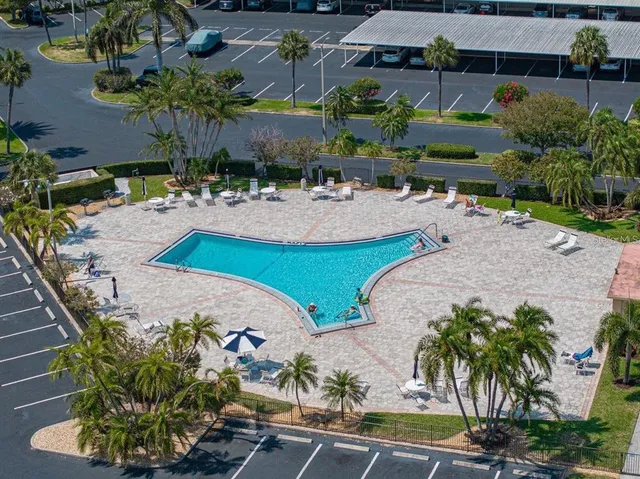 an aerial view of a house with outdoor space swimming pool and outdoor space