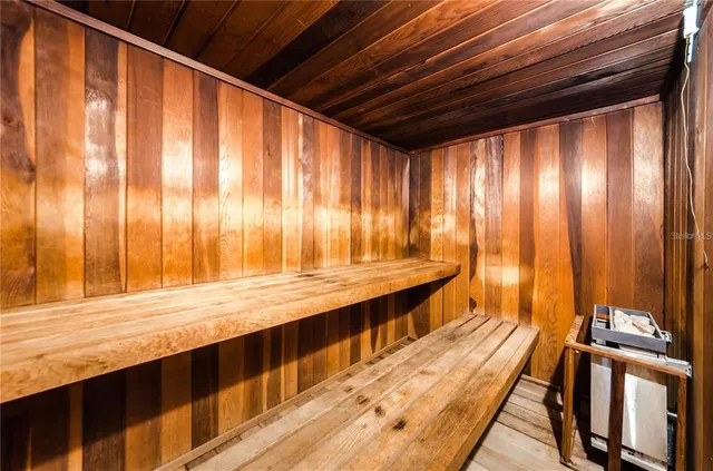 a view of wooden floor and iron stairs