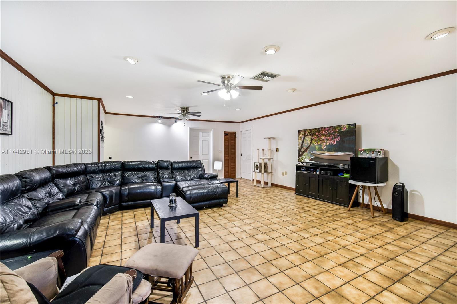 18475 Southwest 206th Street Miami, FL 33187 - Photo 31 of 49 a living room with furniture