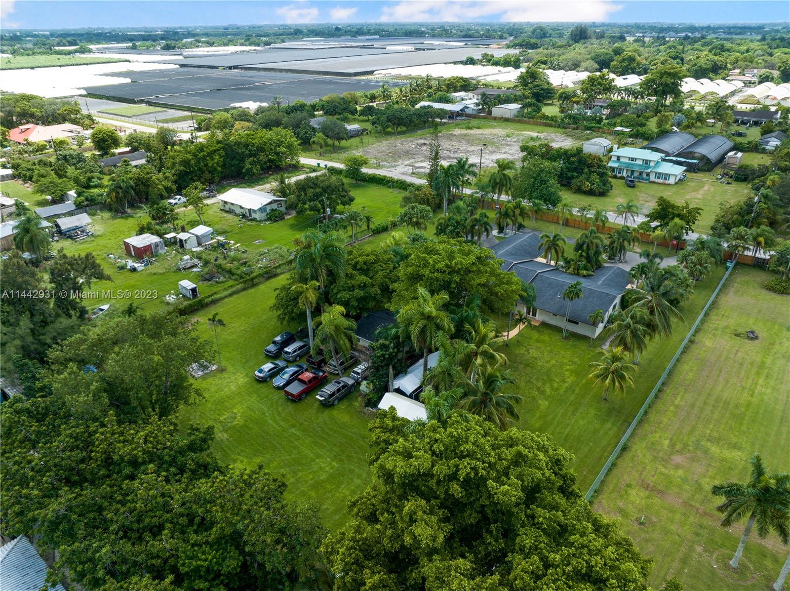 18475 Southwest 206th Street Miami, FL 33187 - Photo 46 of 49 a view of a garden