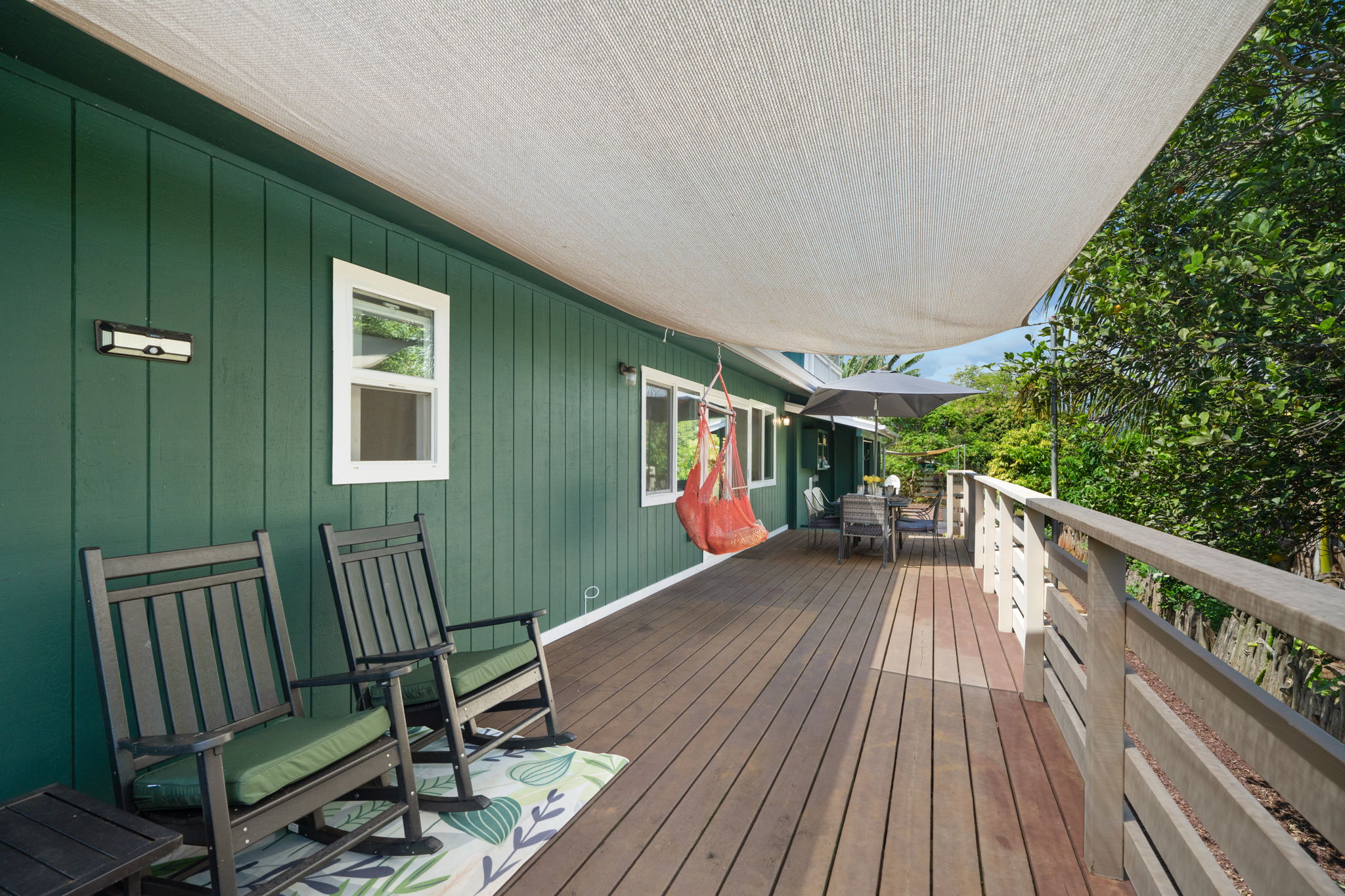 6100 Kawaihau Road Kapaa, HI 96746 - Photo 9 of 22 a view of a chairs on the deck