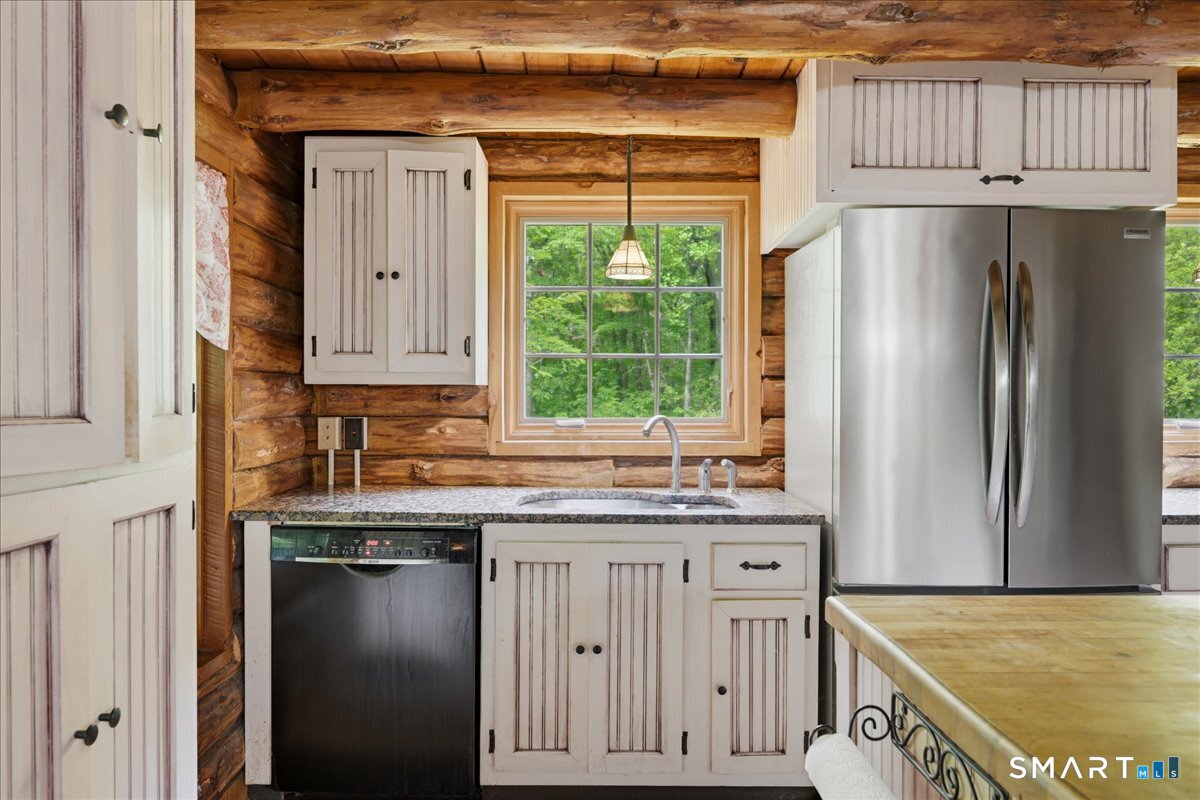 115 Green Hill Road Killingworth, CT 06419 - Photo 18 of 40 Bright kitchen workspace with a view