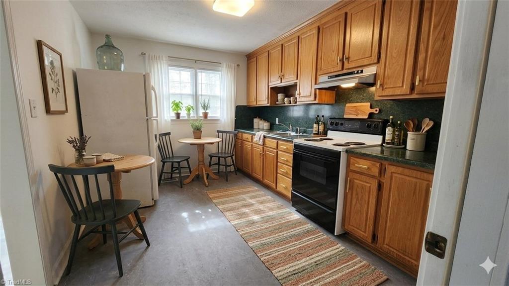 1141 Fieldcrest Road Eden, NC 27288 - Photo 14 of 18 Staged with AI - Kitchen