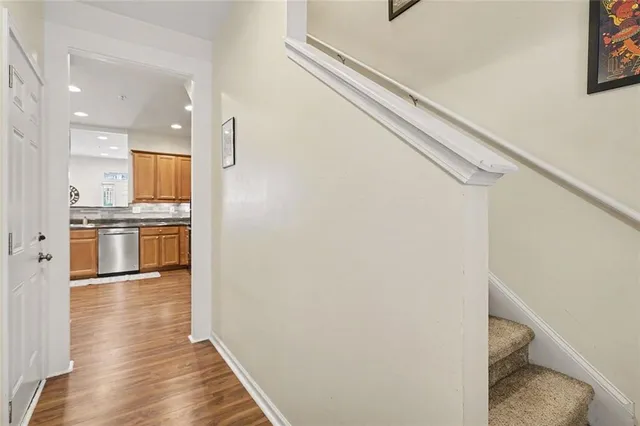a view of kitchen with wooden floor