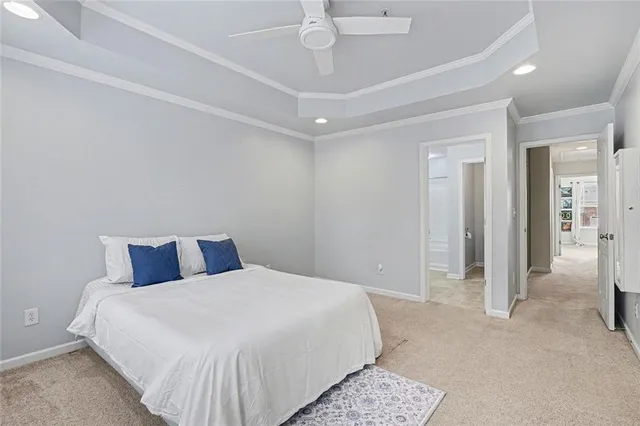 a bathroom with a shower curtain and a sink