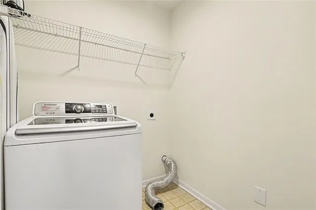 a front view of a house with a garage