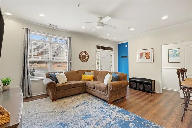 a living room with furniture and a window