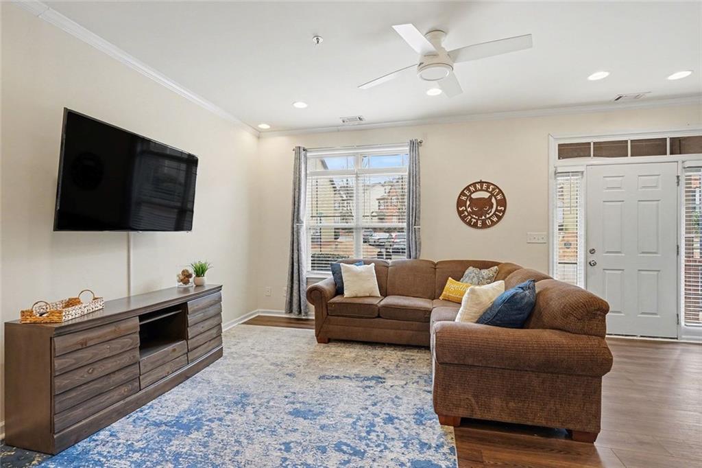 537 Ridge View Crossing Woodstock, GA 30188 - Photo 5 of 38 a living room with furniture and a flat screen tv