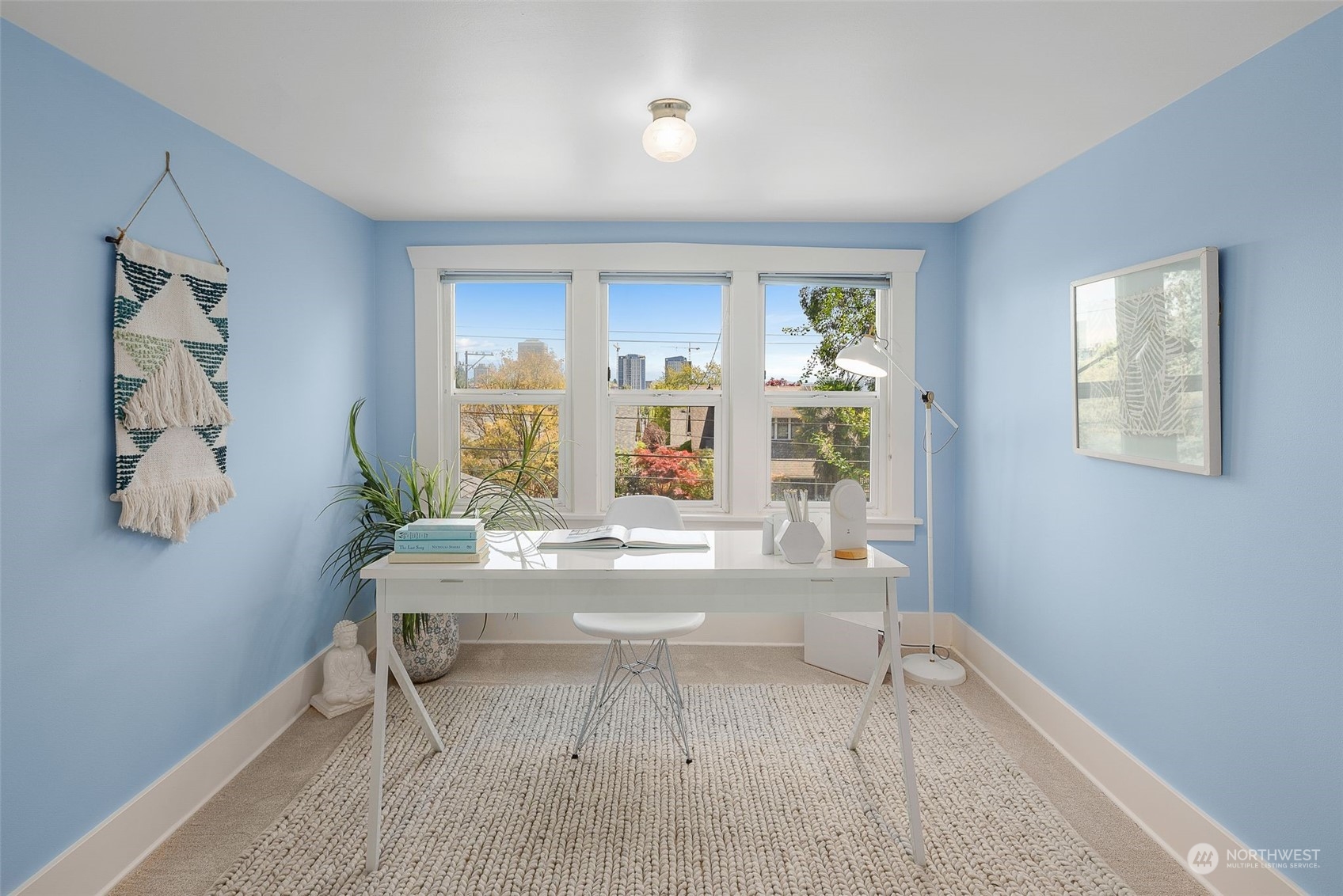 4229 Eastern Avenue North Seattle, WA 98103 - Photo 12 of 32 a living room with a couch and a table