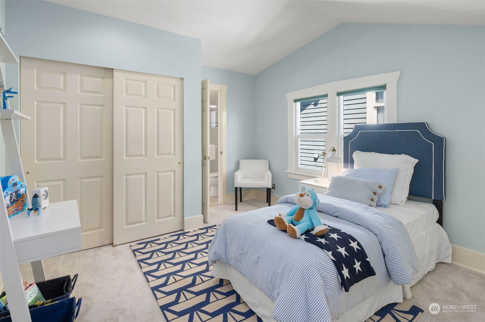 4229 Eastern Avenue North Seattle, WA 98103 - Photo 18 of 32 a bedroom with a bed and a window
