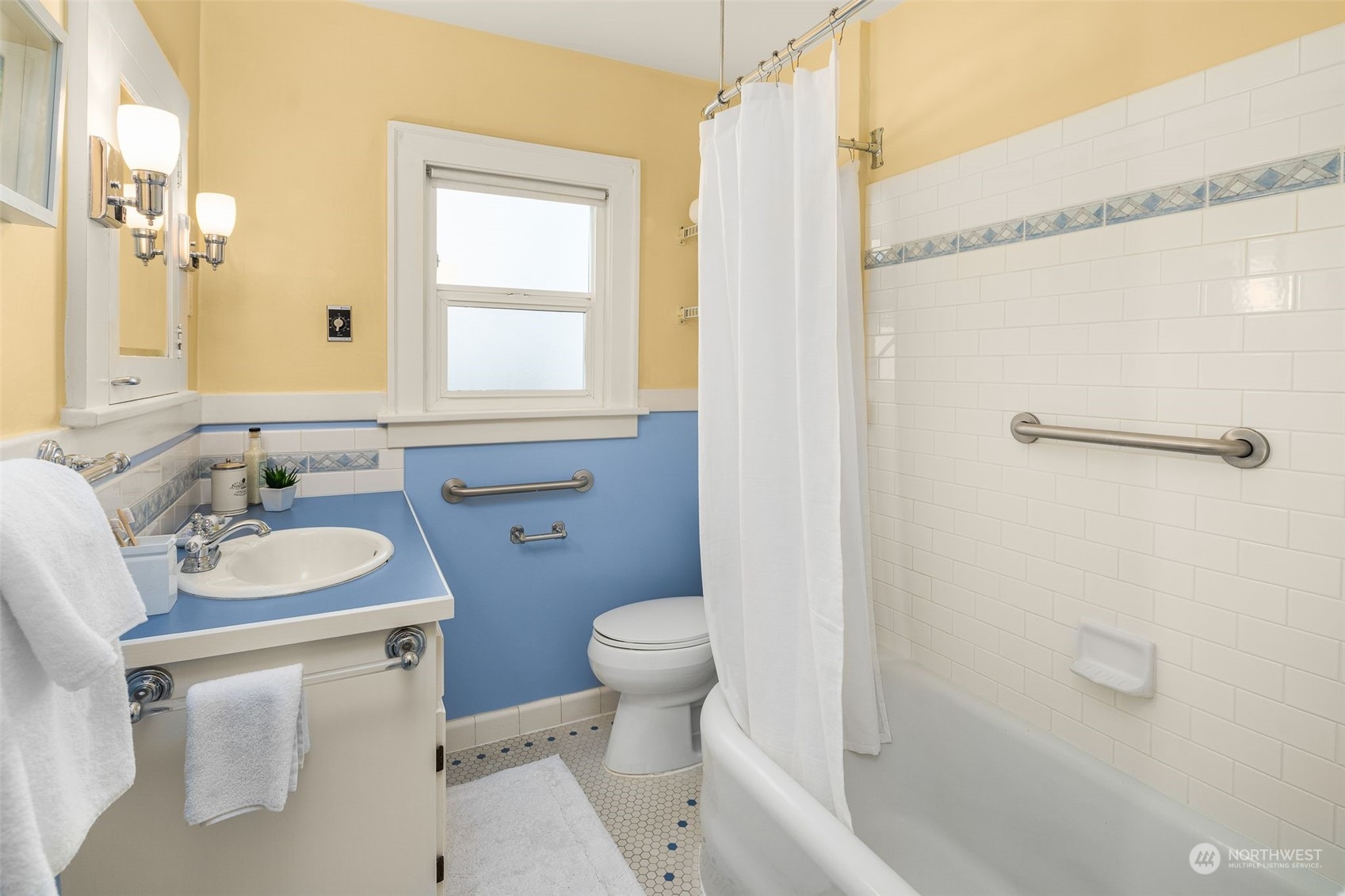 4229 Eastern Avenue North Seattle, WA 98103 - Photo 20 of 32 a bathroom with a sink toilet and shower