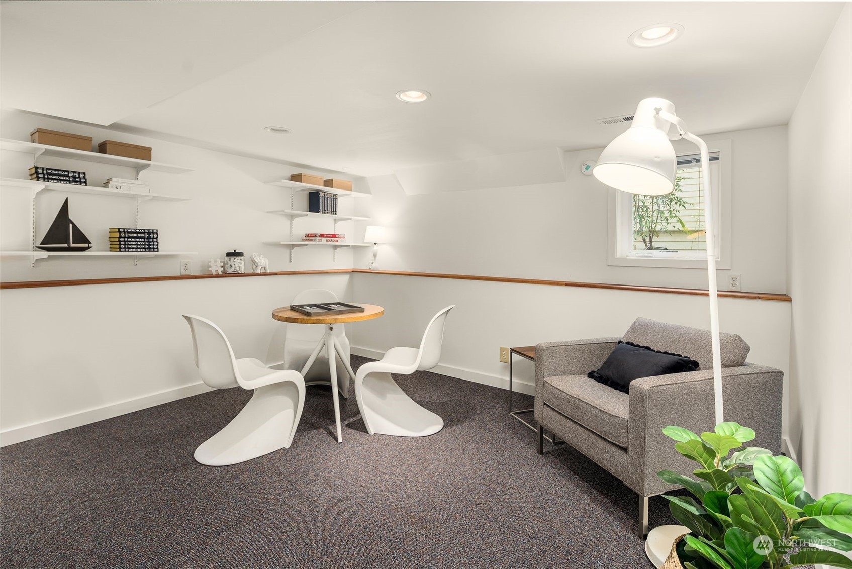 4229 Eastern Avenue North Seattle, WA 98103 - Photo 22 of 32 a living room with furniture and a potted plant