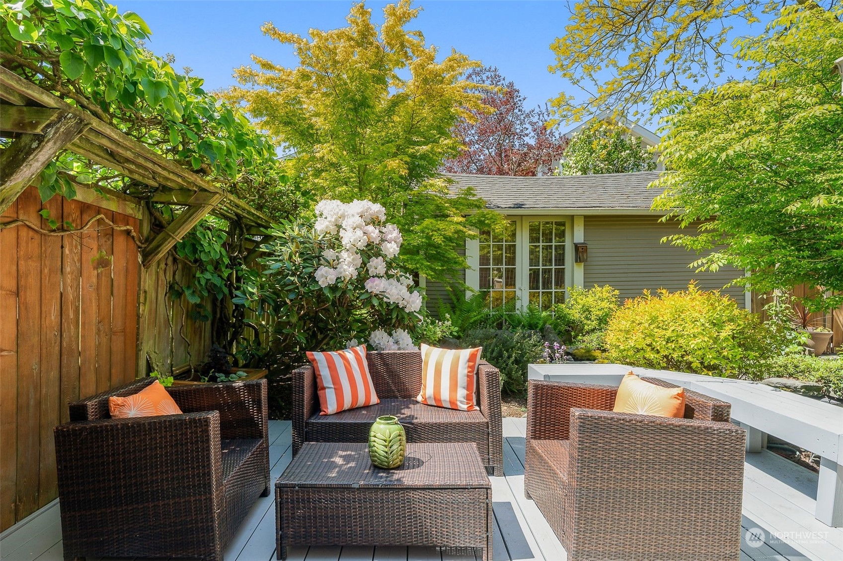 4229 Eastern Avenue North Seattle, WA 98103 - Photo 26 of 32 a view of a patio with couches table and chairs and potted plants