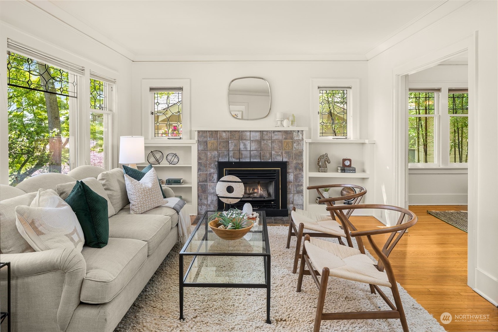 4229 Eastern Avenue North Seattle, WA 98103 - Photo 4 of 32 a living room with furniture and a fireplace