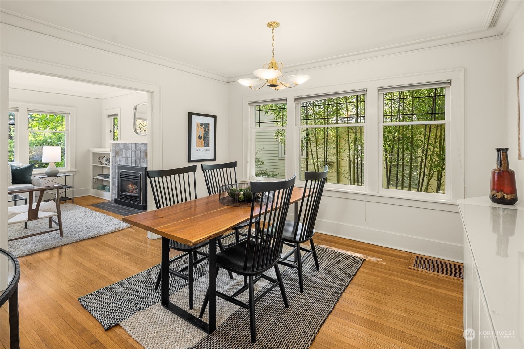 4229 Eastern Avenue North Seattle, WA 98103 - Photo 6 of 32 a dining room with furniture window and wooden floor
