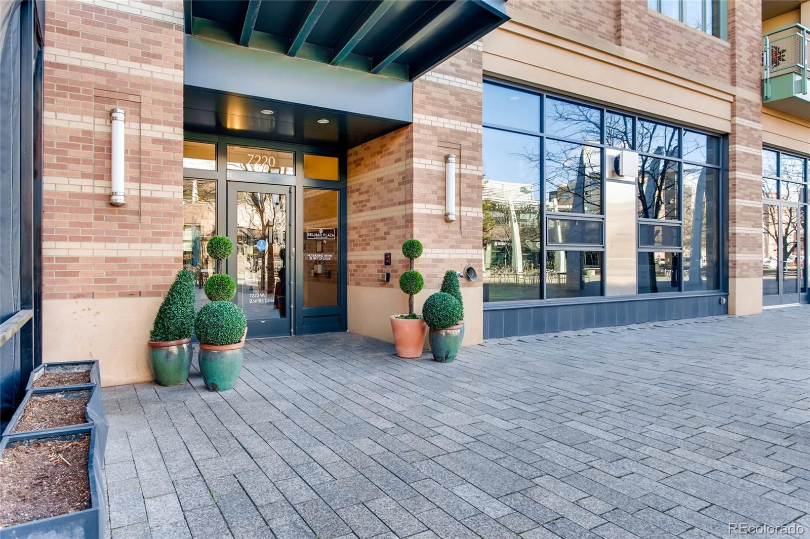 7220 W. Bonfils Lane, Unit 410 Lakewood, CO 80226 - Photo 4 of 27 a view of a street with seating area