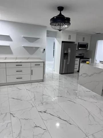 a view of workspace with cabinet