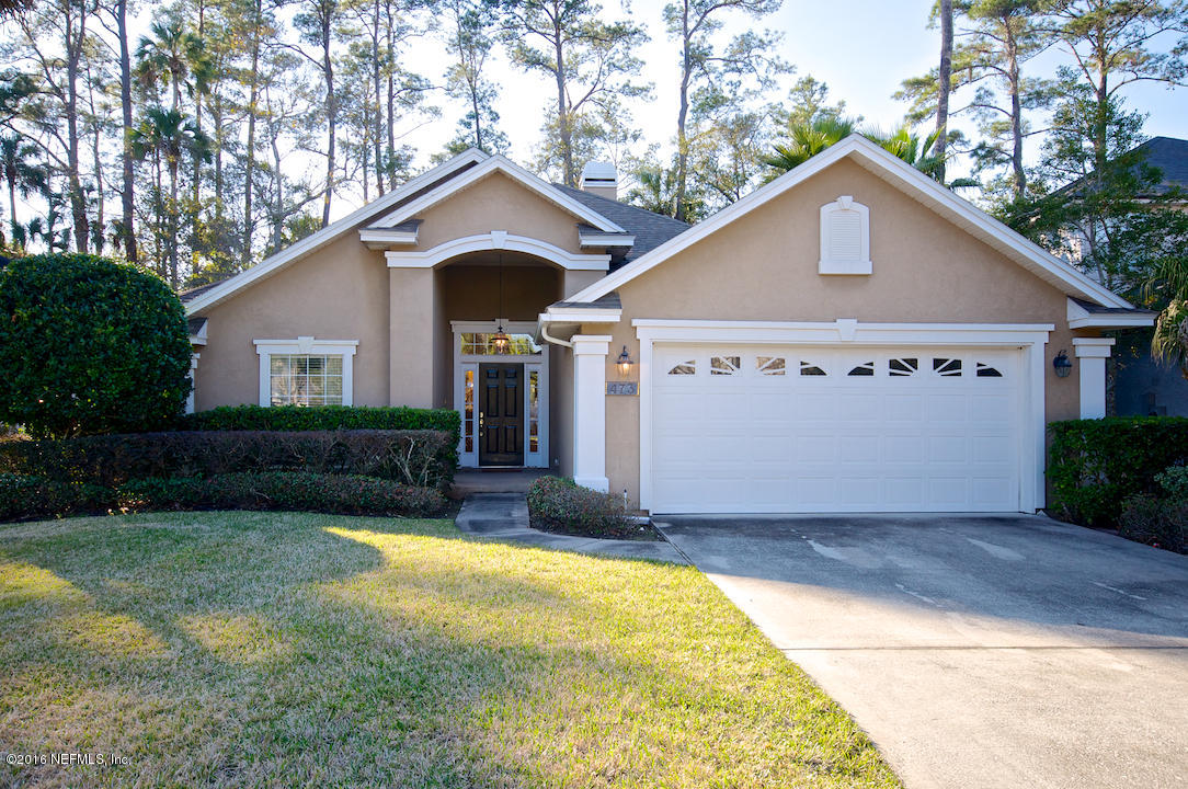 473 Big Tree Road Ponte Vedra Beach, FL 32082 - Photo 1 of 21 a front view of house with yard and trees in the background