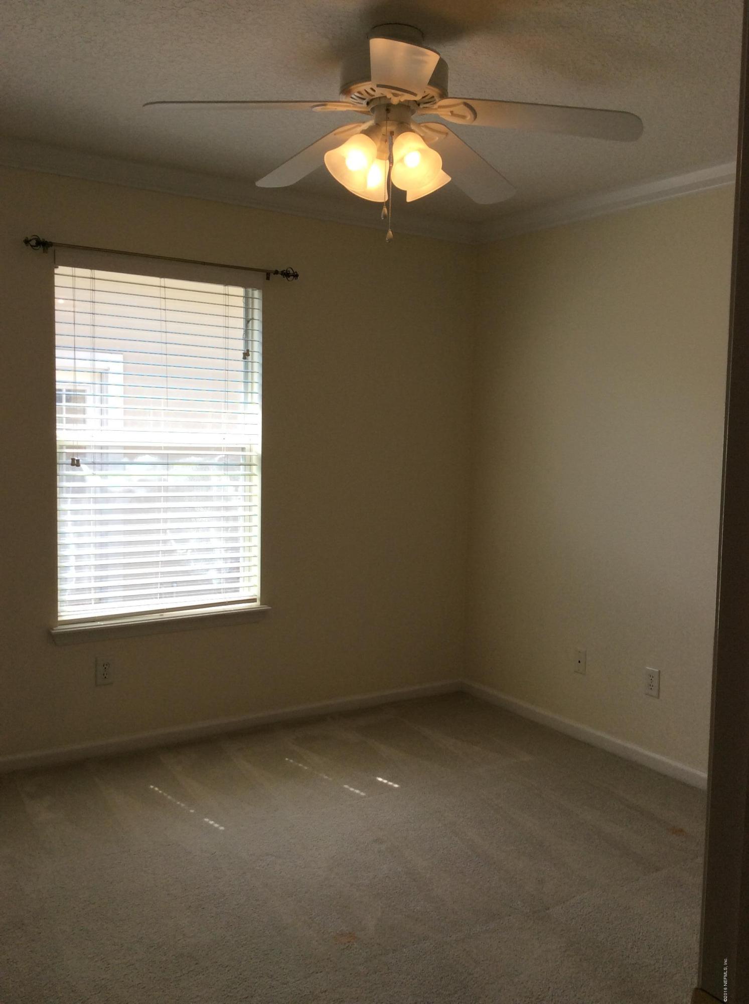 473 Big Tree Road Ponte Vedra Beach, FL 32082 - Photo 12 of 21 a view of an empty room with a window