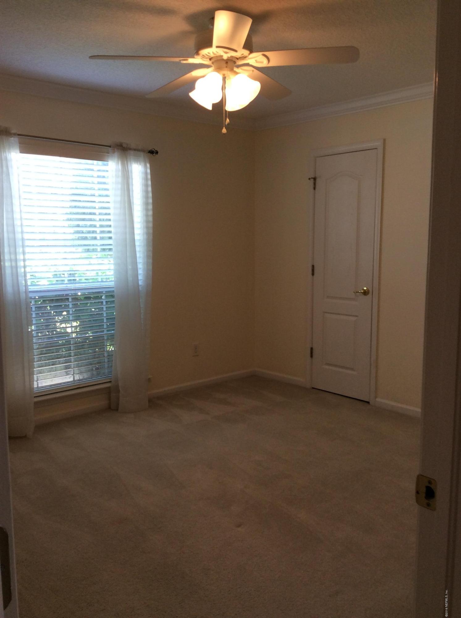 473 Big Tree Road Ponte Vedra Beach, FL 32082 - Photo 13 of 21 a view of an empty room with a window